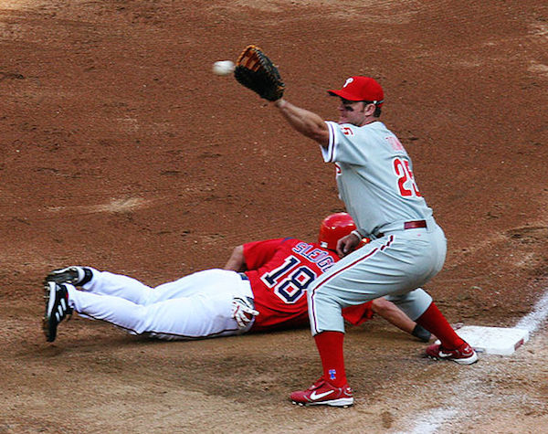 What does "the play is to" 1st, 2nd, or 3rd base mean in baseball?