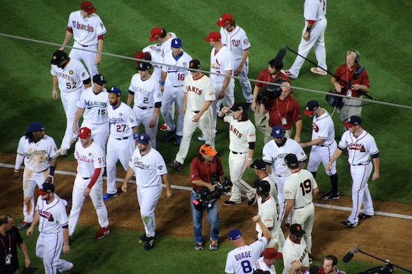 Why does each team get a player in the MLB All-Star game?